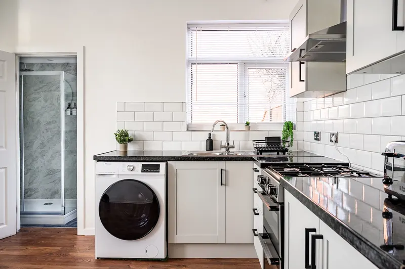 Manchester serviced apartment kitchen and workspace